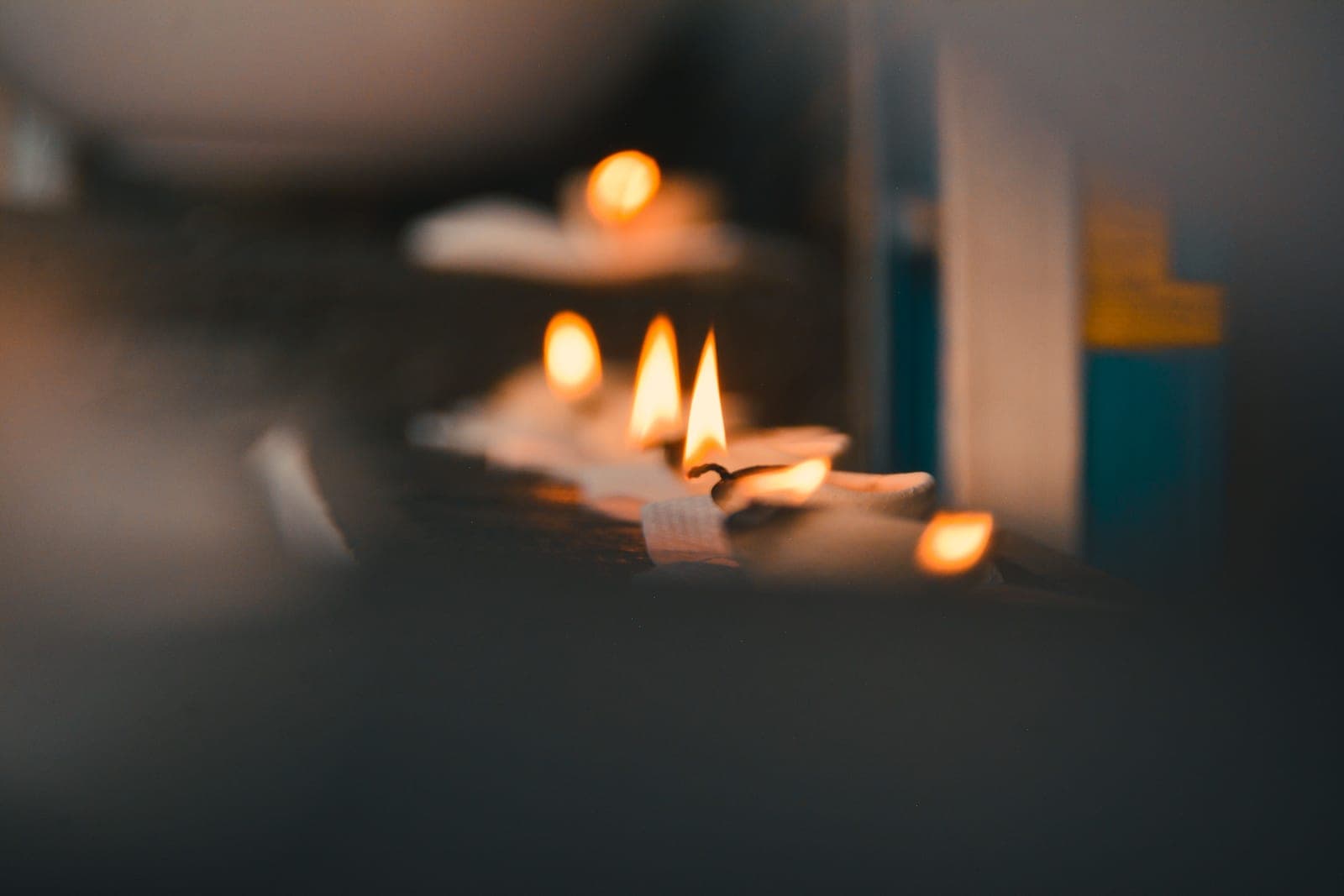 Close view of a candle flame and wick